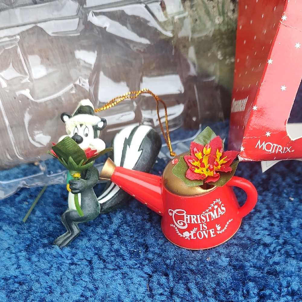 Christmas Is Love Ornament with Skunk and Watering Can/1998